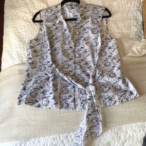 White embroidered sleeveless blouse